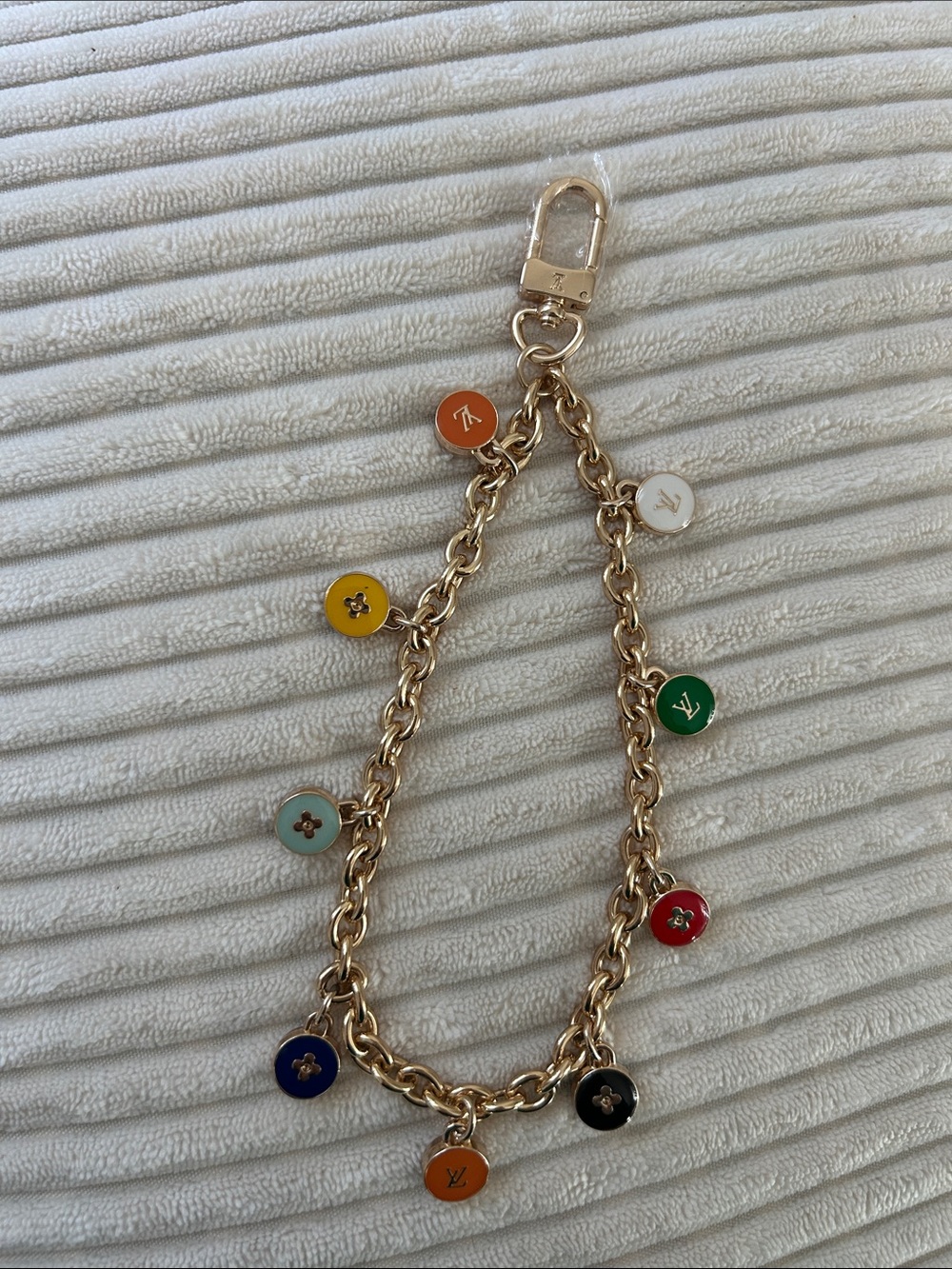 Multicolor Enamel Skittle Keychain - Gold-Tone. 7” in length.